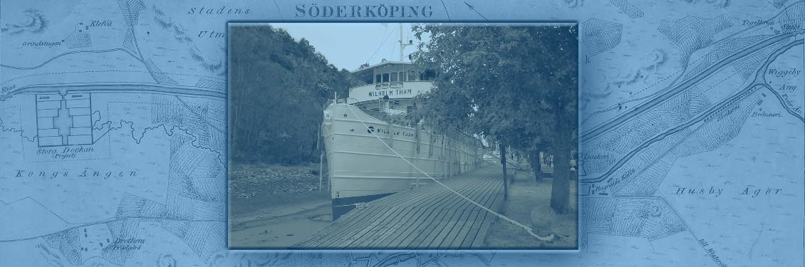 Karta över Göta kanal med en kanalbåt vid kaj