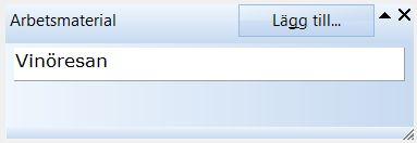 Panel med ett arbetsmaterial inlagt